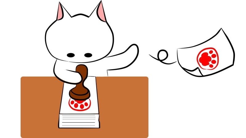 区分記載請求書の処理をする猫の事務員